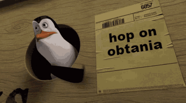 a penguin is sticking its head out of a hole next to a piece of paper that says hop on obania