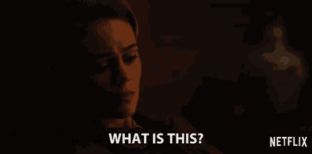 a woman is asking what is this in a dark room