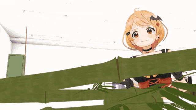 a little girl with a bat on her head is behind a fence