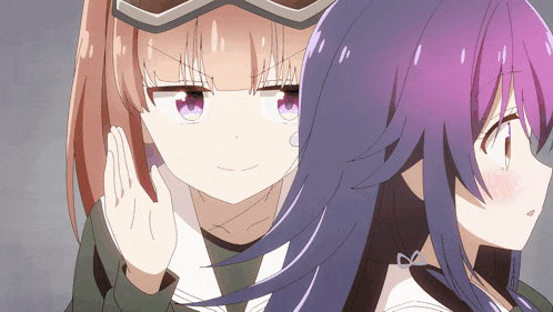 a girl with purple hair is standing next to a girl with red hair
