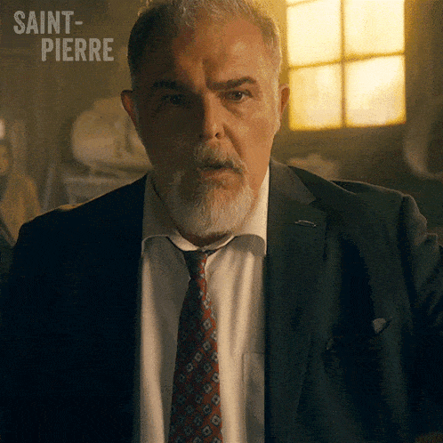 a man in a suit and tie with saint-pierre written on the bottom right