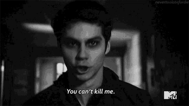 a black and white photo of a man with his mouth open and the words `` you can t kill me '' .