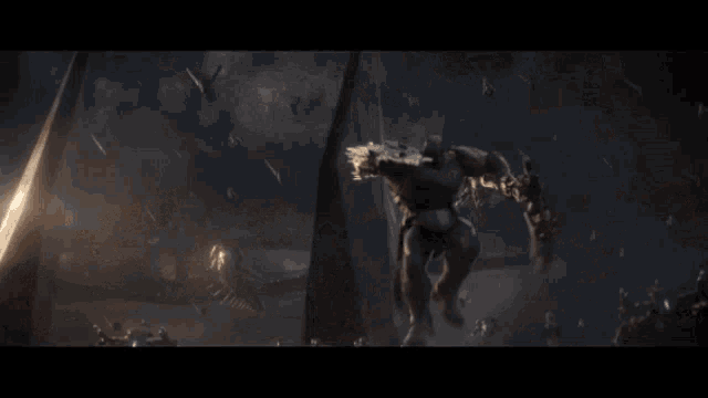 a crowd of people are gathered in front of a giant monster