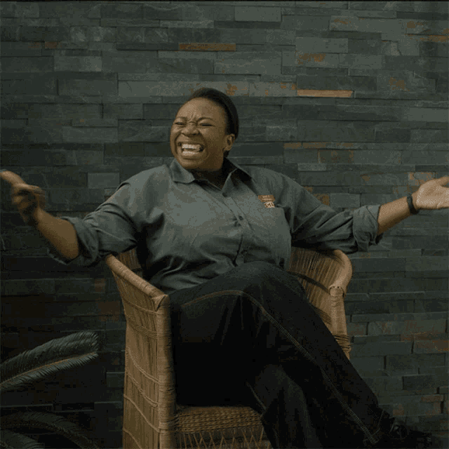 a woman sits in a chair with her arms outstretched and the words that thing above her