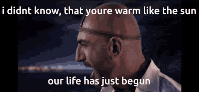 a bald man with a headband on his head and the words " i didnt know that youre warm like the sun "