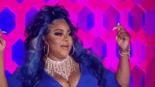 a woman with blue hair and a necklace is dancing on a pink and blue background .