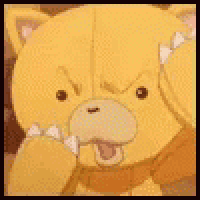 a yellow teddy bear with a scarf around its neck is making a funny face with its mouth open .
