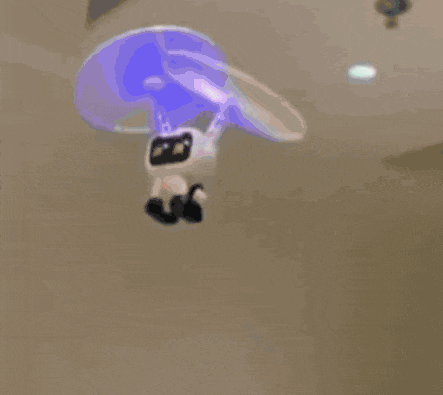 a stuffed astronaut with a flashlight on his head