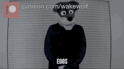a person in a wolf costume with the words eggs written on their chest