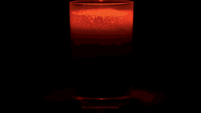 a glass of red liquid with the words " not an actual gameplay footage " below it