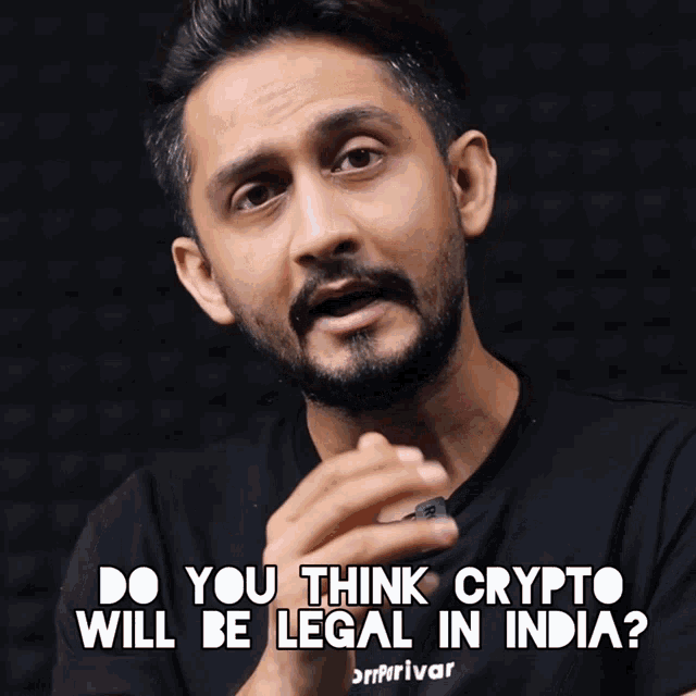 a man with a beard and a black shirt that says do you think crypto will be legal in india