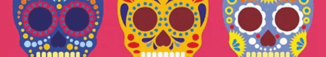 three colorful sugar skulls are lined up on a pink background .