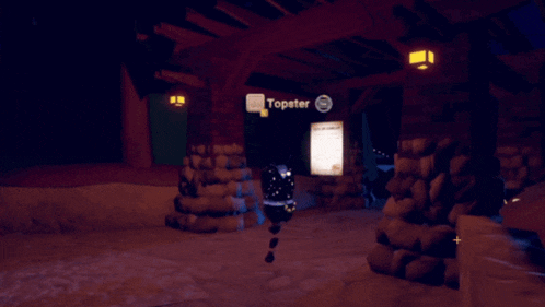 a sign that says topster in a dark room