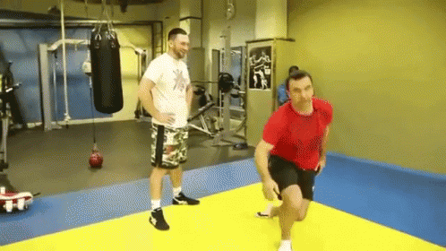 шпагат растяжка борцы тренировка GIF - Split Stretching Kick Boxing GIFs