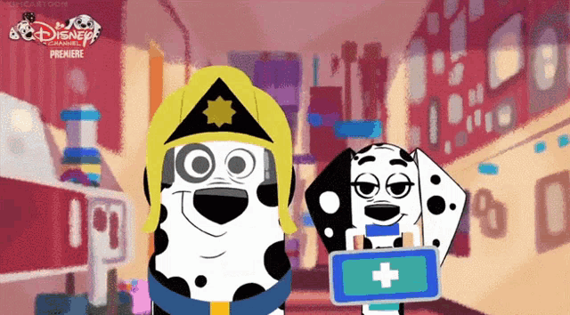 two dalmatian dogs are standing next to each other with a disney channel premiere advertisement in the background