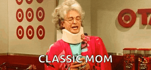 an elderly woman wearing a neck brace and glasses is holding a lollipop and says `` classic mom '' .