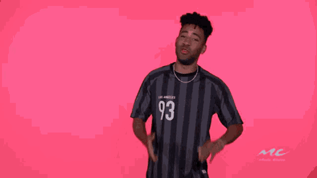 a man wearing a jersey that says 93 on it