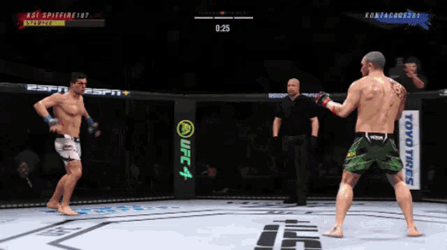 two men are fighting in a boxing ring with a toyo tires ad in the corner