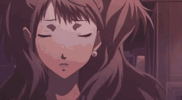 a close up of a girl 's face with a surprised look on her face .
