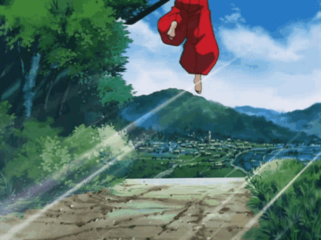 a person in a red outfit is hanging upside down