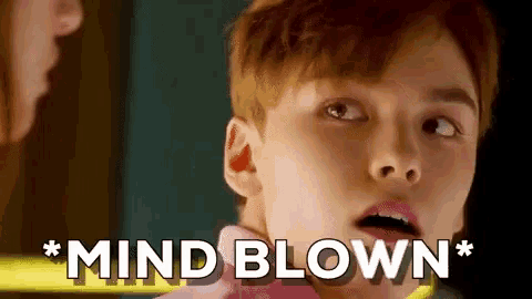 a close up of a person 's face with the words " mind blown " behind him