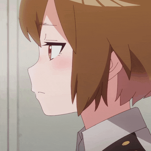 a close up of a girl with brown hair