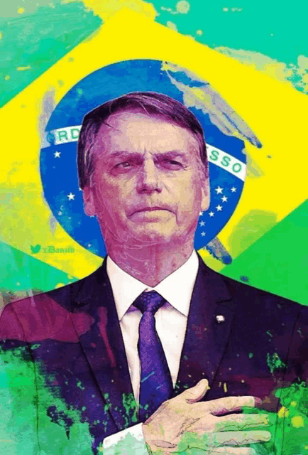 a man in a suit and tie stands in front of a flag that says rc isso