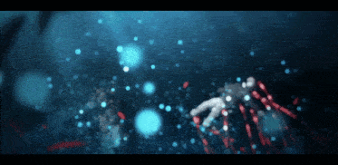 a blurred image of a person swimming in the ocean