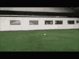 a soccer ball is being kicked in a soccer field