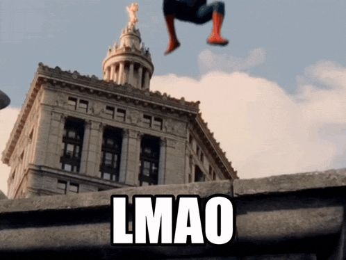 a man in a spiderman costume is jumping in the air with the word lmao written below him