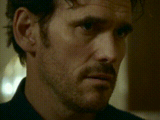 a close up of a man 's face with the word if on the bottom left