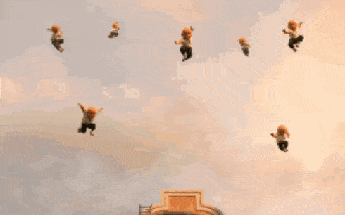 a man is standing in front of a bunch of babies that are jumping in the air .