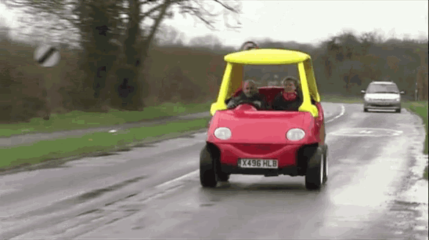 a red car with a license plate that says x496 hlb