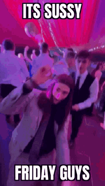a group of people are dancing in a room with a caption that says its sussy friday guys