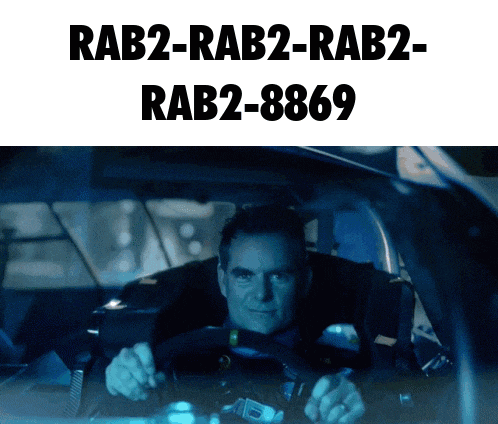 a man is driving a car with the words rab2-rab2-rab2 rab2-8869 written above him