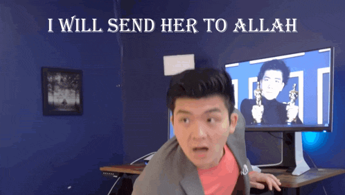 a man stands in front of a computer monitor with the words " i will send her to allah "