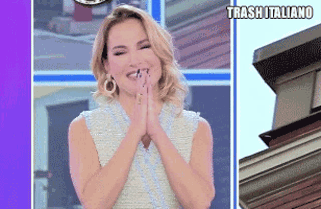 a woman is smiling with trash italiano written on the bottom right