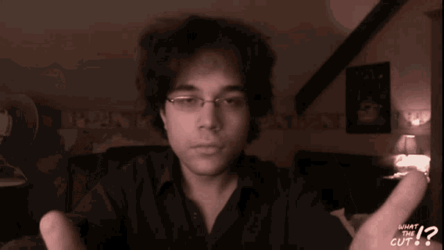 a man giving the middle finger with the words what the cut in the corner
