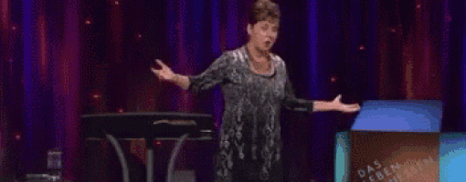 a woman is giving a speech in front of a podium that says das fernsehen