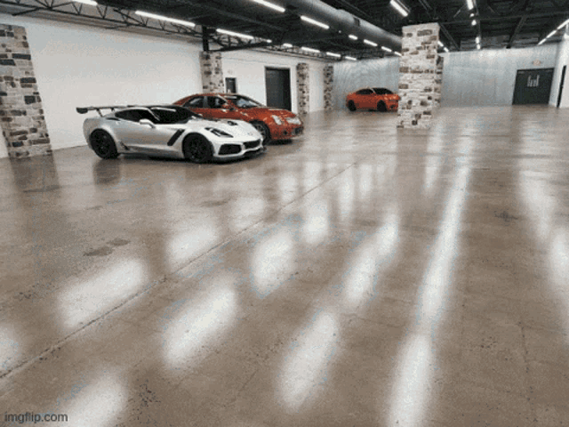 three sports cars are parked in a garage with imgflip.com at the bottom right