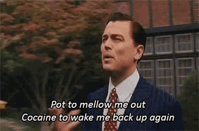 a man in a suit and tie is walking down a street with a quote .