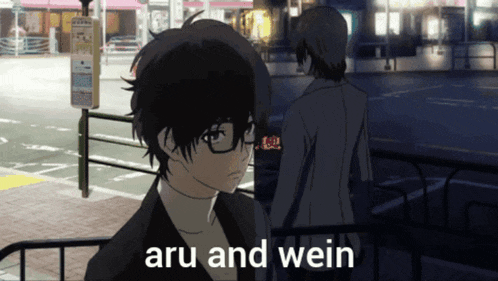 a man with glasses stands next to another man with the words aru and wein above him