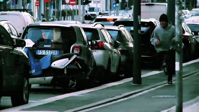 a smart car with a license plate that says fs317sb