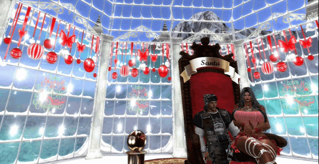 a man and a woman are sitting in a chair that says santa