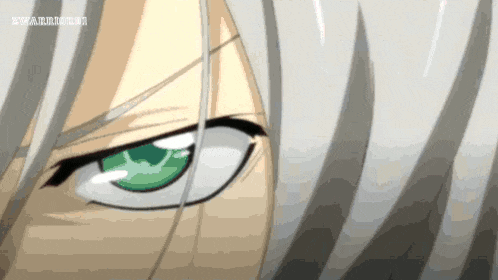 a close up of a person 's eyes with a watermark that says kwaii.ii.ii.ii.