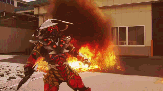 a cartoon character is standing in front of a building with fire coming out of it