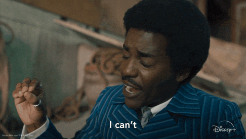 a man in a blue suit says i can t