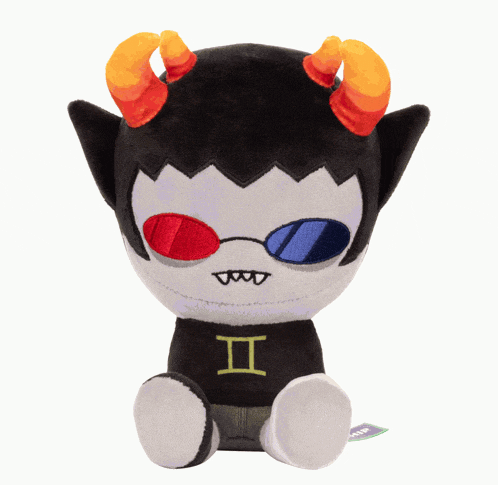a stuffed toy with horns and a shirt that says ii on it