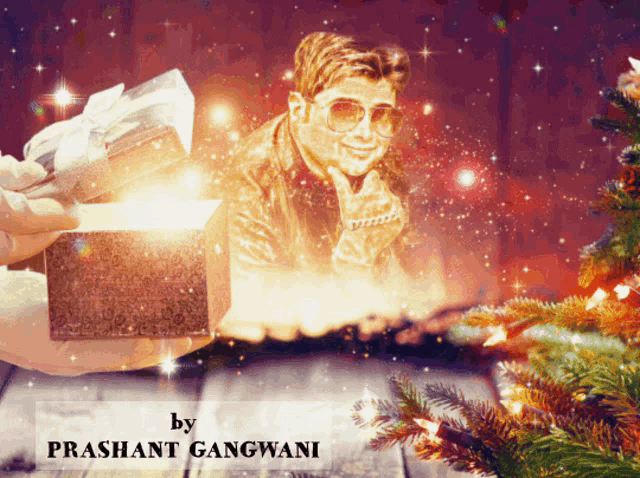 a picture of a man holding a gift with the name prashant gangwani