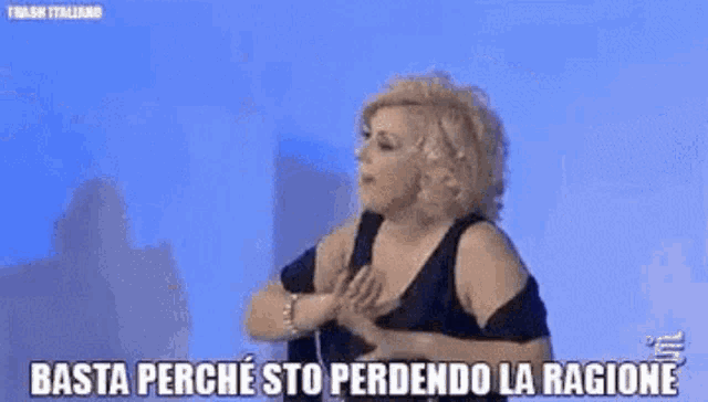 a woman says basta perche sto perdendo la ragione on a blue background
